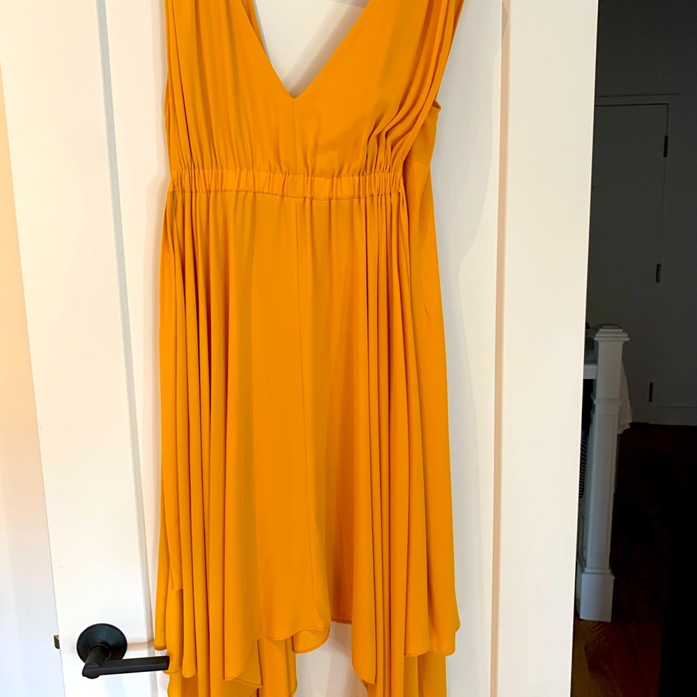 BCBG handkerchief yellow dress size L fits a regular size 14